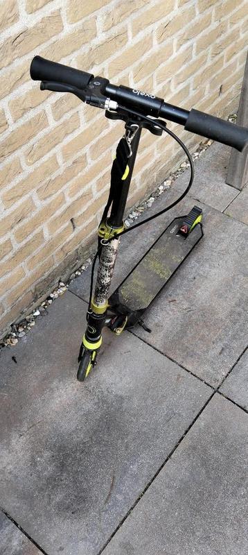 Geel/zwarte opvouwbare stuntstep van Oxelo (zie foto's) beschikbaar voor biedingen