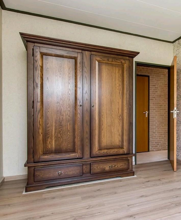 Antieke eikenhougen kledingkast, Ophalen