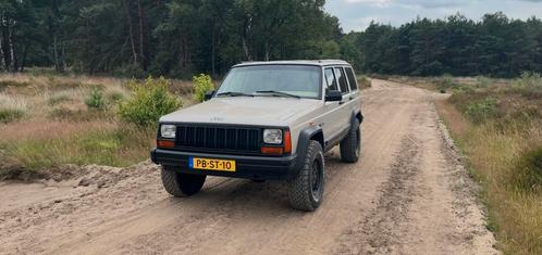 Jeep Cherokee 4.0 I LE AUT 4WD 1996 Beige, Auto's, Jeep, Particulier, Cherokee, Airbags, Airconditioning, Alarm, Bluetooth, Centrale vergrendeling