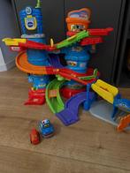 Vtech politiegarage, Kinderen en Baby's, Speelgoed | Vtech, Ophalen, Zo goed als nieuw, 6 maanden tot 2 jaar