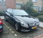 Mercedes-Benz E-Klasse E200 2.0 135KW Aut7 2013 Zwart, Auto's, Achterwielaandrijving, Zwart, 4 cilinders, Zwart