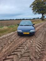 Mitsubishi Colt 1.3 GLI E2 1996 Blauw, Auto's, Mitsubishi, 1299 cc, 750 kg, Leder en Stof, Colt
