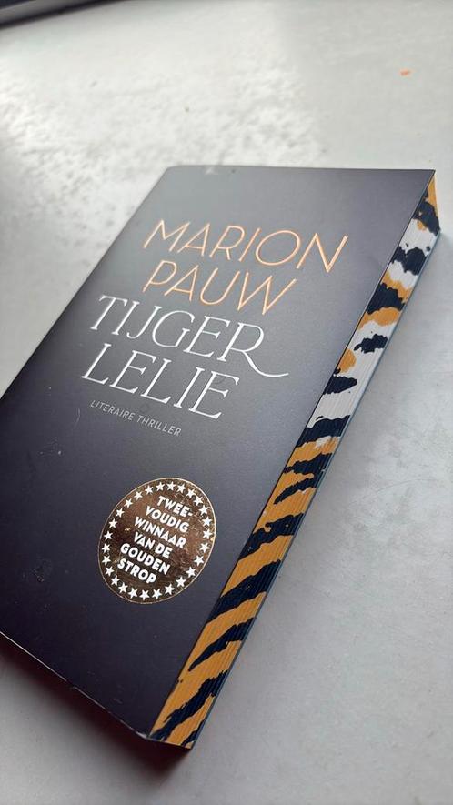 Marion Pauw - Tijgerlelie, Boeken, Thrillers, Zo goed als nieuw, Nederland, Ophalen of Verzenden