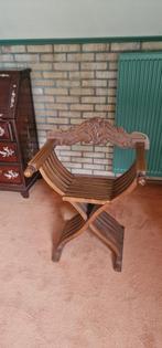 Houten stoel, Ophalen