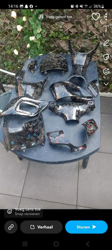 Piaggio/Gilera carbon onderdelen  beschikbaar voor biedingen