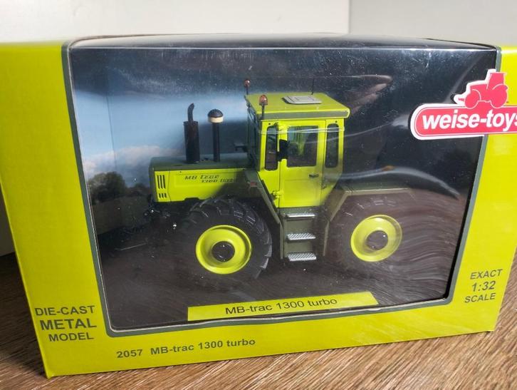 Te koop MB-Trac 1300 Turbo Treckerle Gelimiteerd model., Hobby en Vrije tijd, Modelauto's | 1:32, Zo goed als nieuw, Tractor of Landbouw