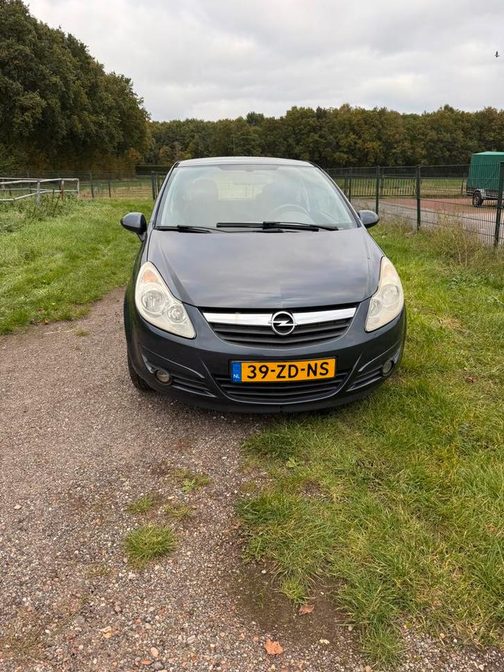 Opel Corsa 1.2 16V 3D WR 2007 Grijs, Auto's, Opel, Particulier, Corsa, Airbags, Airconditioning, Boordcomputer, Centrale vergrendeling
