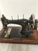 Veritas naaimachine, Ophalen