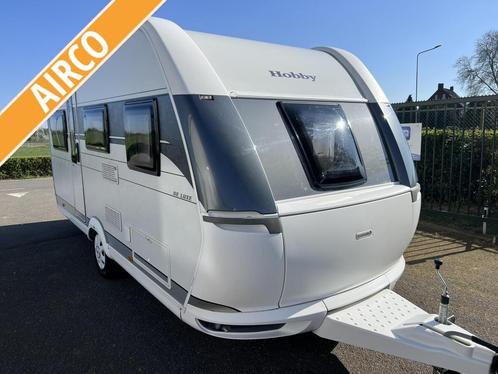 Hobby De Luxe 455 UF - Airco - Vast bed - 1500 kg as., Caravans en Kamperen, Caravans, Bedrijf, tot en met 4, 1000 - 1250 kg, Rondzit