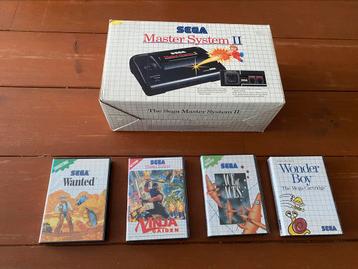 Sega Master system II boxed + 4 games
