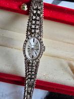 18 k. Wit goud Hislon horloge met briljant, Ophalen of Verzenden, Goud, Overige merken