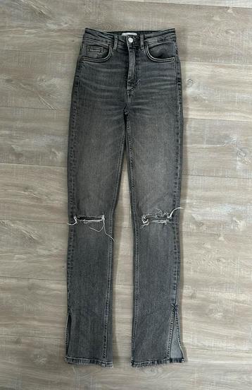 Grijze flare jeans beschikbaar voor biedingen
