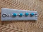 Nieuwe zilveren armband met turkoois kleur steen., Blauw, Nieuw, Ophalen of Verzenden, Met edelsteen