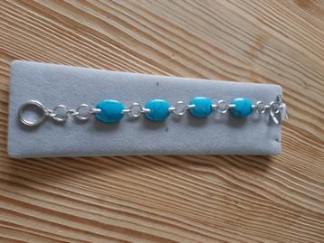 Nieuwe zilveren armband met turkoois kleur steen. beschikbaar voor biedingen