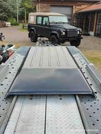 Land Rover Defender PUMA Tdci dak Santorini Zwart, Ophalen, Gebruikt, Land Rover, Achterklep