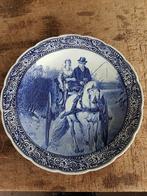 delfts blauw wandbord. Echtpaar op de hoogkar., Ophalen
