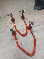 Paddock steunen voor plus achter, Ophalen