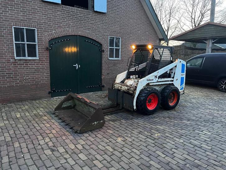 Bobcat 743, schranklader met bak en lepels, Zakelijke goederen, Machines en Bouw | Kranen en Graafmachines, Wiellader of Shovel