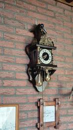 Wandklok, Ophalen
