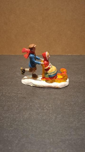 Lemax Ice Sledding, kerstdorp poppetjes beschikbaar voor biedingen