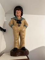 Groot beeld van een matroos, Ophalen