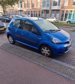Toyota Aygo 1.0 12V Vvt-i 5DRS 2011 Blauw, Auto's, Toyota, Voorwielaandrijving, Euro 5, Stof, 68 pk