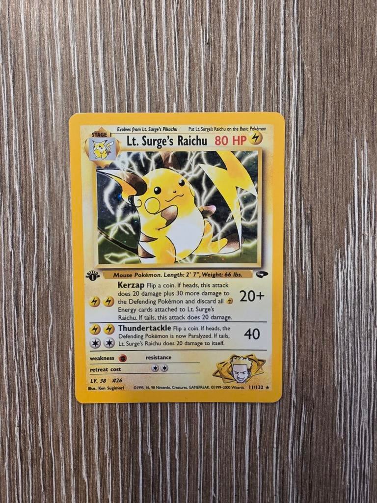 Pokemon Lt. Surge's Raichu first edition #11/132, Hobby en Vrije tijd, Verzamelkaartspellen | Pokémon, Ophalen of Verzenden, Zo goed als nieuw