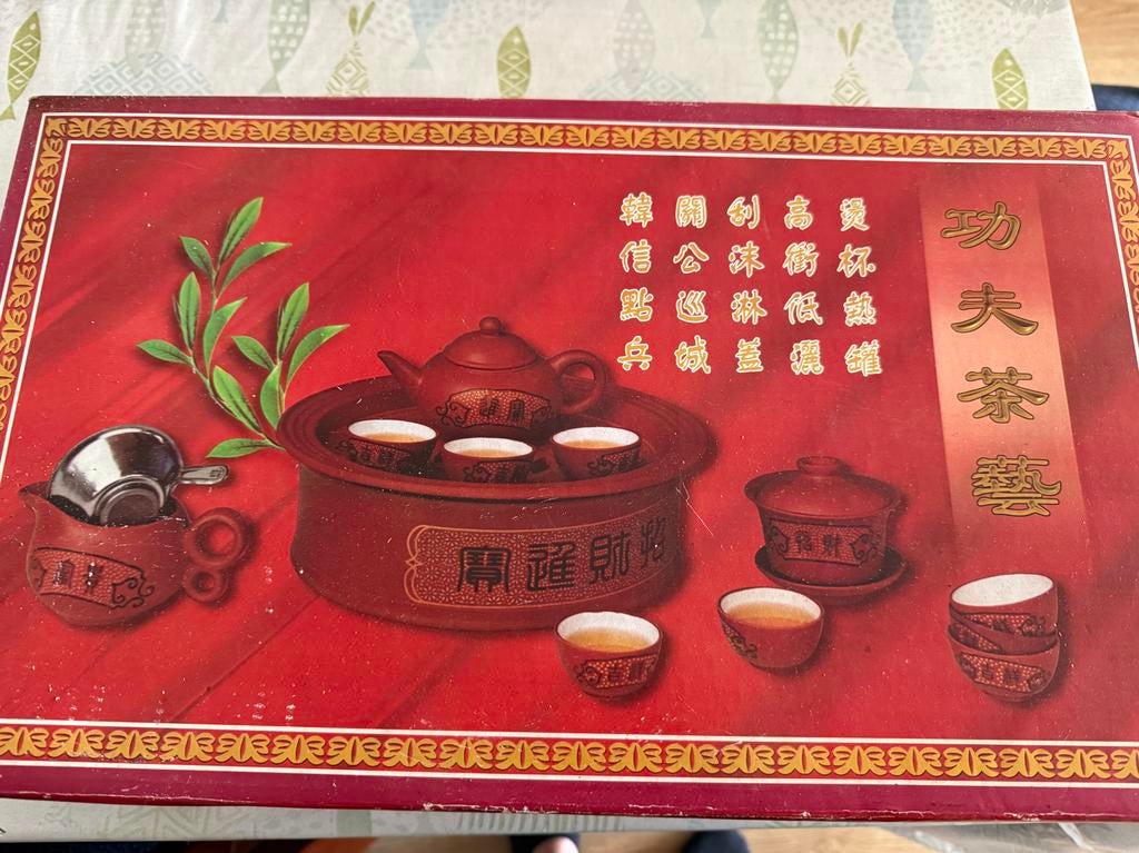 Chinese theeset in doos, Ophalen