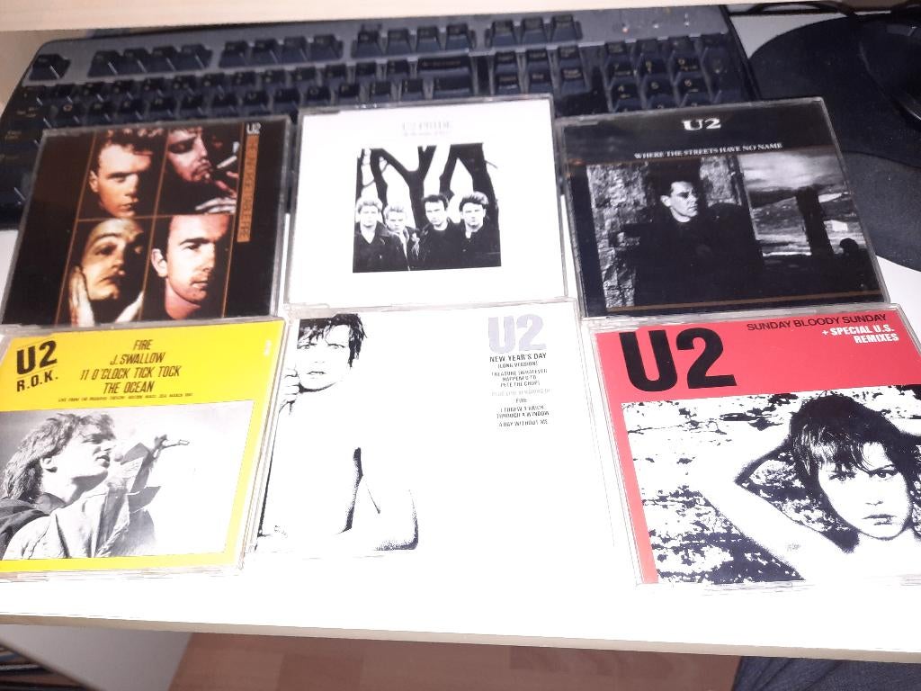 23X CD SINGLE U2, Ophalen, Zo goed als nieuw, Pop