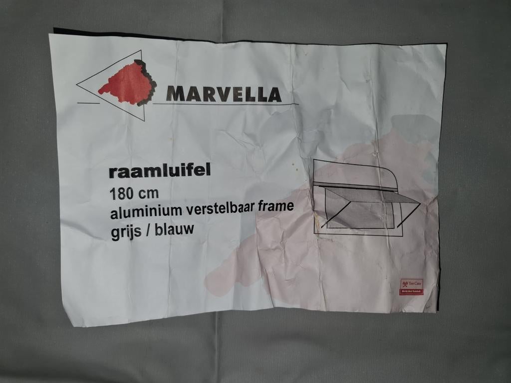 Raamluifel caravan, Ophalen, Zo goed als nieuw