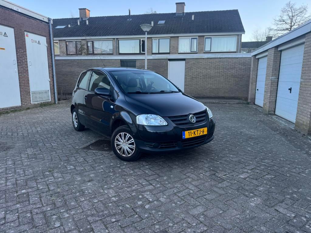 Volkswagen Fox 1.2 40KW 2010 Zwart (apk 03-27), Auto's, Voorwielaandrijving, 969 kg, 4 stoelen, 1198 cc