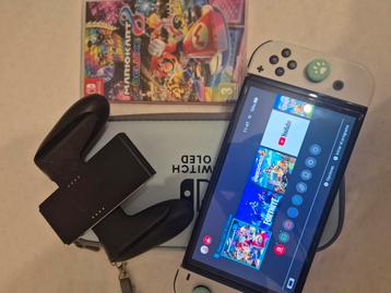 Nintendo Switch OLED + Mario Kart Deluxe  beschikbaar voor biedingen
