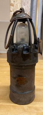 Oude mijnwerkerslamp, Ophalen