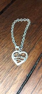 Zilverkleurig armbandje Guess
Met strass steentjes, Sieraden, Tassen en Uiterlijk, Armbanden, Staal, ., Ophalen of Verzenden, Zo goed als nieuw