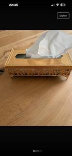 Goudkleurige zakdoekhouder henna, Ophalen