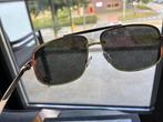 Mooie en nieuwe zonnebril met het logo in het glas, Zonnebril, Bruin, Nieuw, Ophalen of Verzenden