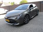 Toyota Corolla 1.8 Hybrid 122pk CVT Business, Auto's, Automaat, Gebruikt, 4 cilinders, Bruin