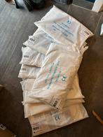 8x 100 stuks plastic schorten - Nieuw in verpakking, Ophalen of Verzenden, Nieuw, Wit, Schort