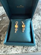BRON, Sieraden, Tassen en Uiterlijk, Oorbellen, Hangers, Geel, Ophalen of Verzenden, Zo goed als nieuw