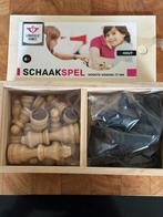 nieuwe doos met schaakstukken van hout, Een of twee spelers, Ophalen, Nieuw