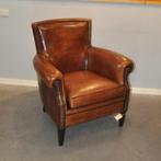 Schapenleren fauteuil in nieuwstaat, Huis en Inrichting, Fauteuils, Ophalen, Zo goed als nieuw, 50 tot 75 cm, Leer