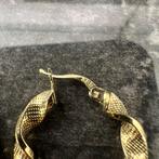 Gouden oorbellen wokkels 14 karaat nieuw, Ophalen of Verzenden, Zo goed als nieuw, Goud