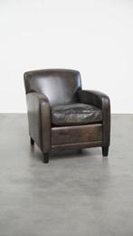 Zwart/ grijze design fauteuil gemaakt van schapenleer, Huis en Inrichting, Fauteuils, Ophalen, Gebruikt, ., Leer