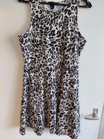 Jurkje mtL zw/wt panter, Kleding | Dames, Jurken, Ophalen of Verzenden, Zo goed als nieuw, Maat 42/44 (L), Overige kleuren