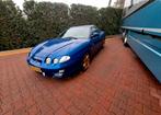 Hyundai Coupé 2.0 I F 2000 Blauw.leuke auto!, Auto's, Voorwielaandrijving, Zwart, Leder en Stof, 49 €/maand