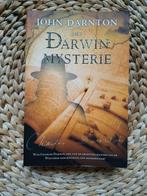 John Darnton - Het Darwin Mysterie, Boeken, Ophalen of Verzenden, Zo goed als nieuw