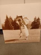 Schilderij Audrey Hepburn met golf sport, Ophalen