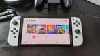 Nintendo Switch Oled wit met 4 spellen en garantie ZGAN!!, Ophalen of Verzenden, Met 3 controllers of meer, Zo goed als nieuw