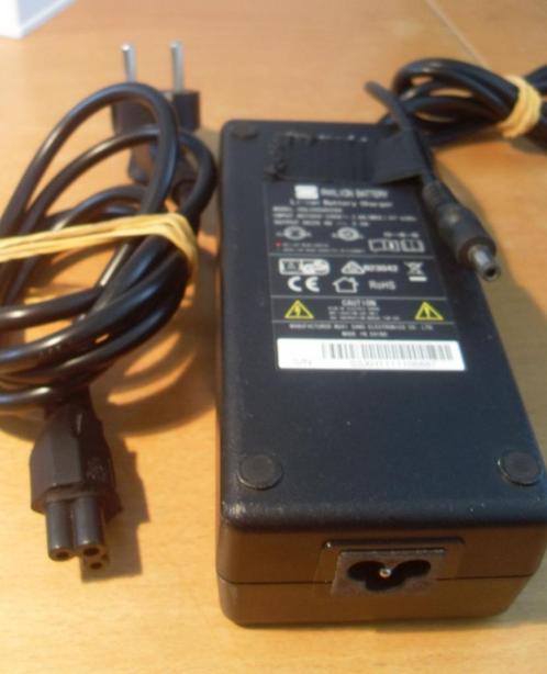 Oplader Sparta E-motion c1/c2/c3 e.a. (29.4 Volt - 2 Amp), Fietsen en Brommers, Fietsaccessoires | Fietsaccu's, Zo goed als nieuw