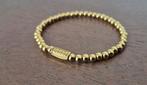Gouden Rebel en Rose armband S goud dames vrouwen & and, Ophalen of Verzenden, Zo goed als nieuw, Goud, Elastiek